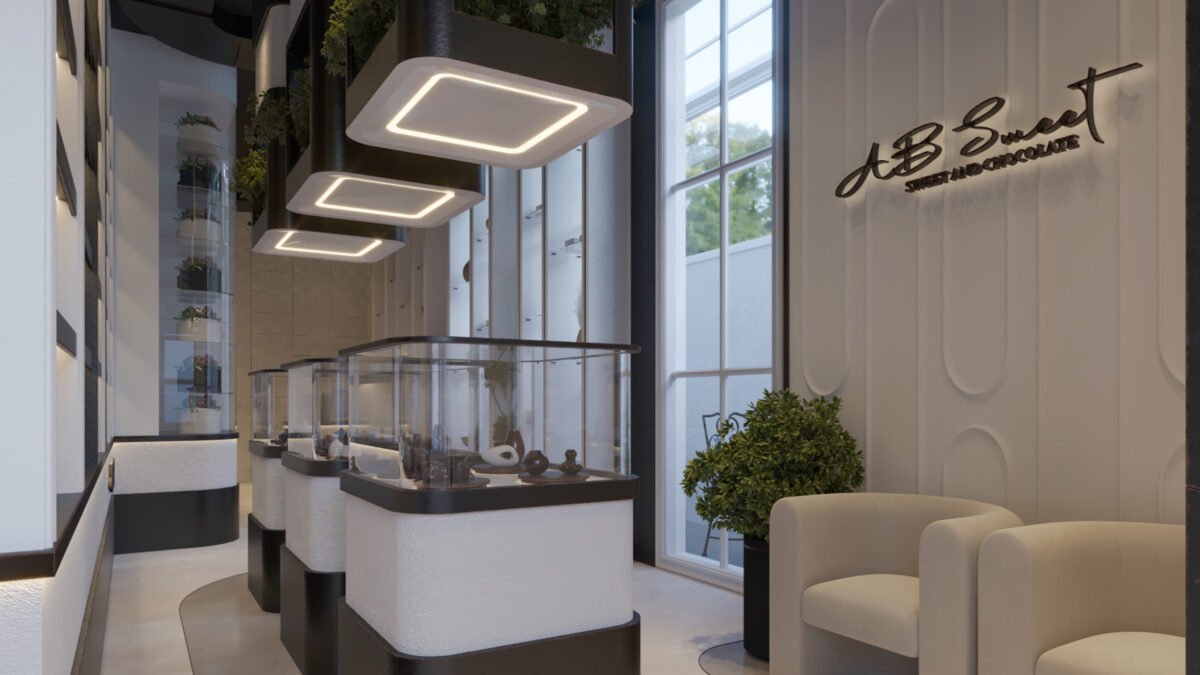 Modern chocolate boutique interior with black and white design and illuminated display units