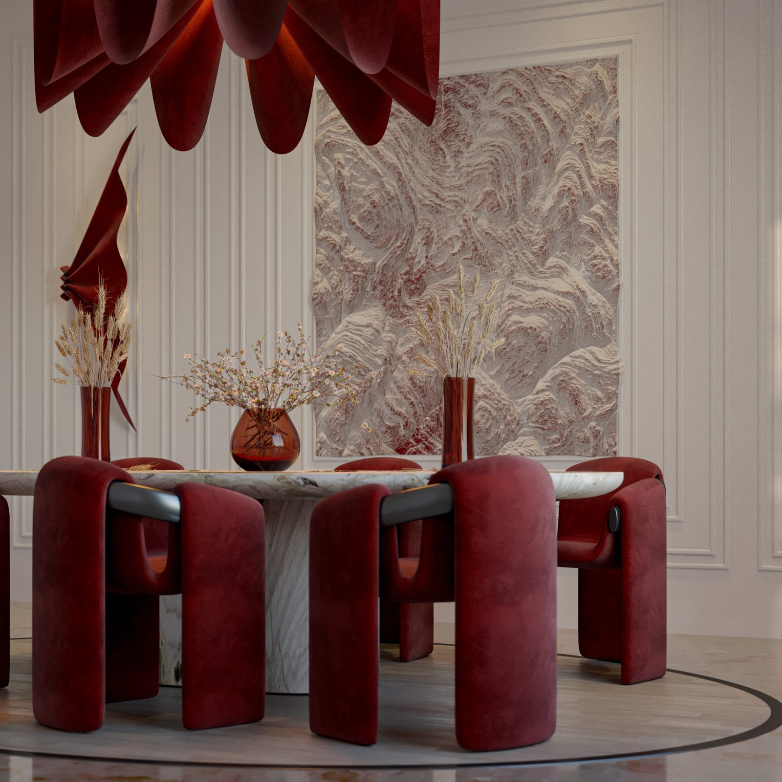  A contemporary dining room featuring a bold red sculptural chandelier, velvet chairs, and a marble table set against a textured wall panel.