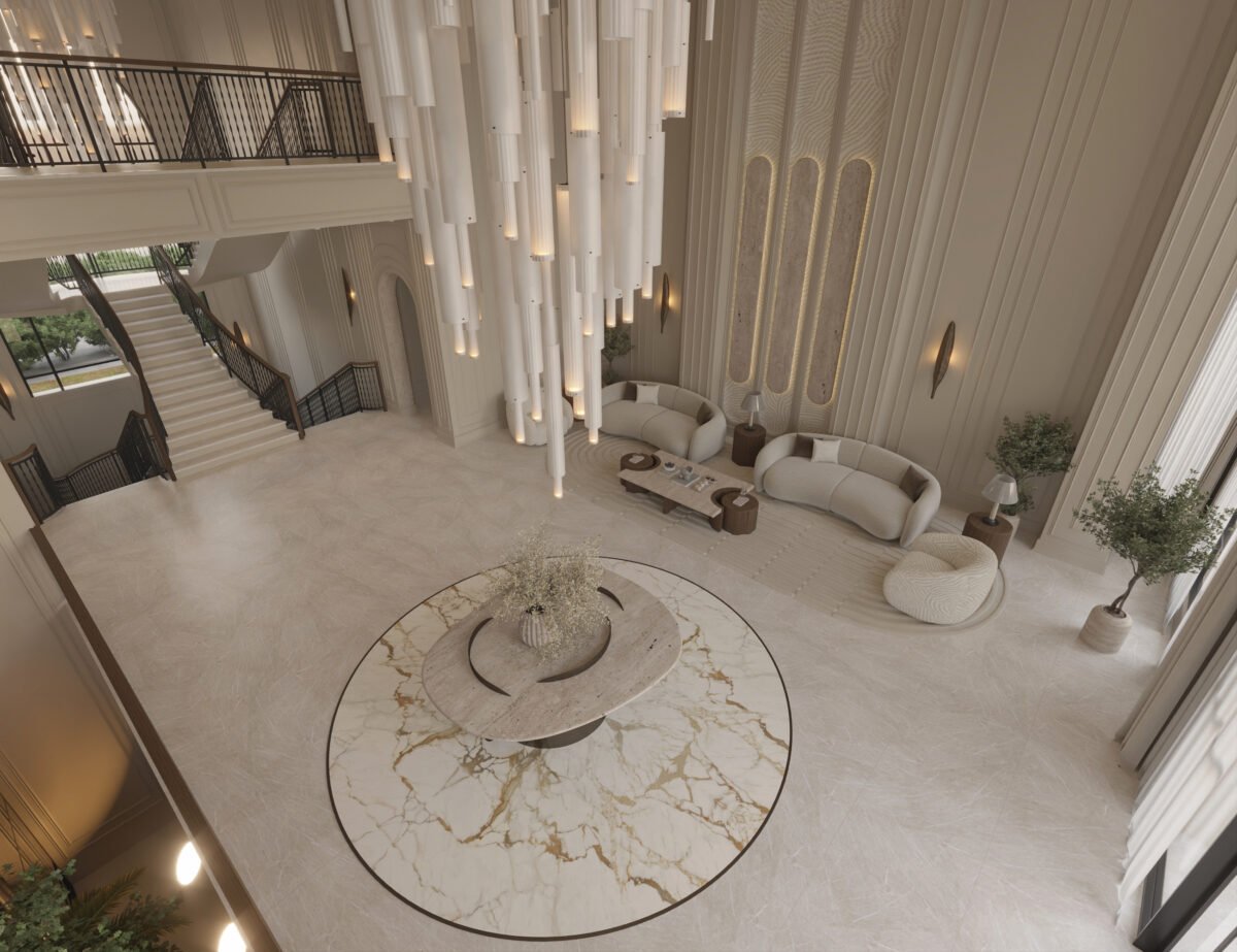 Modern villa entrance hall with sculptural chandelier, marble table, decorative mirrors, and refined wall paneling