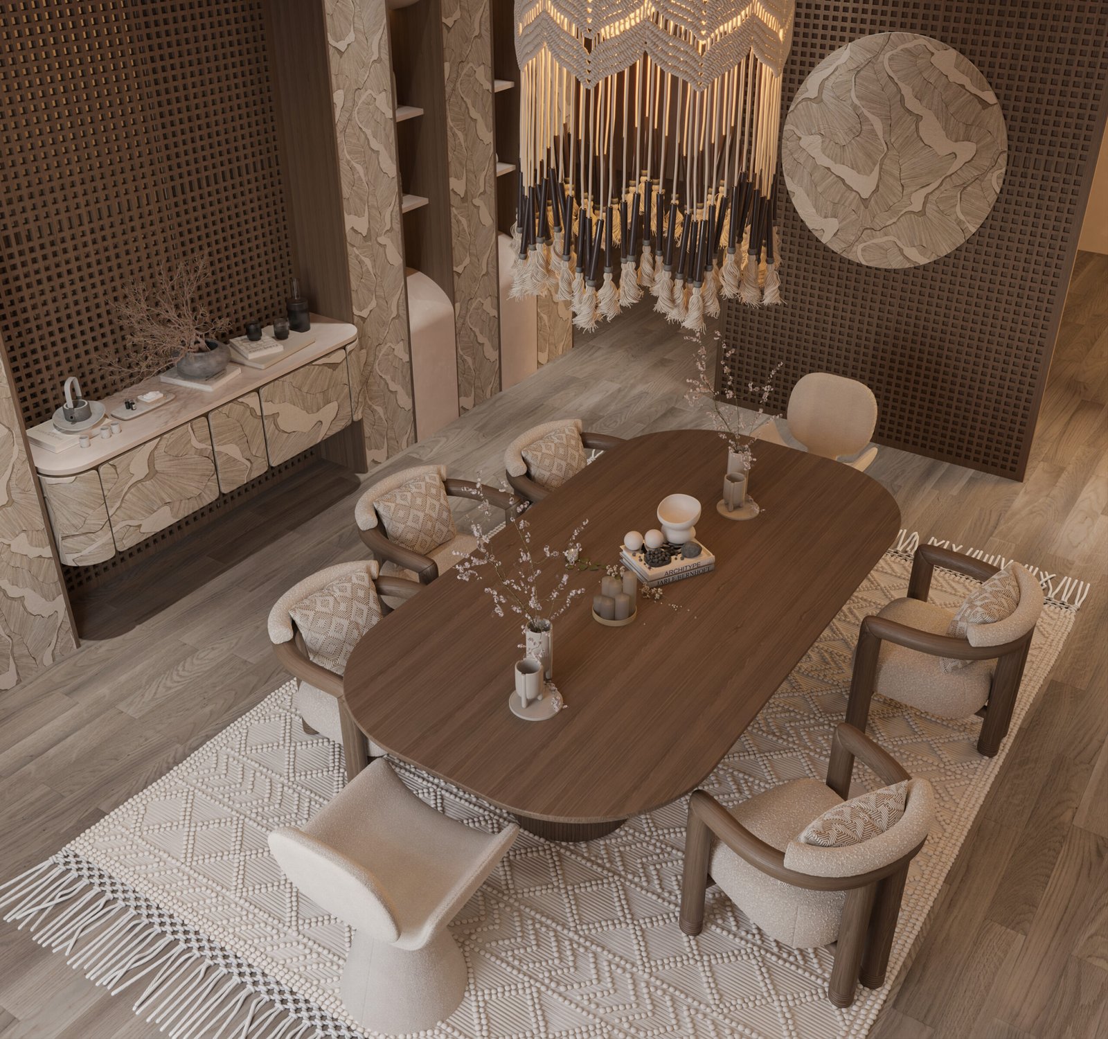 A top-down composition showing the oval wooden dining table surrounded by soft upholstered seating and a textured rug that defines the space.