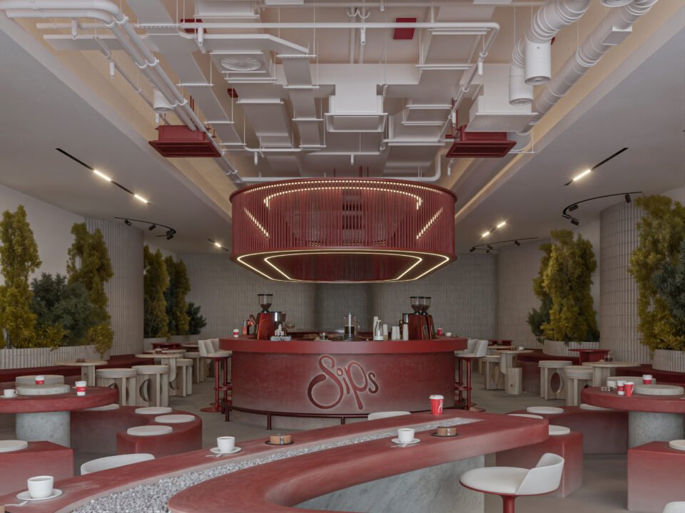 Modern café interior with red curved seating and central bar in Basrah